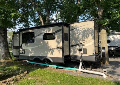 Drivers side of Rockwood travel trailer with one large slide out and one small slide out.