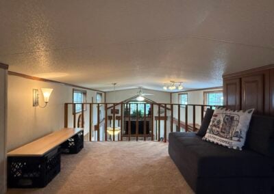 loft with couch and bench