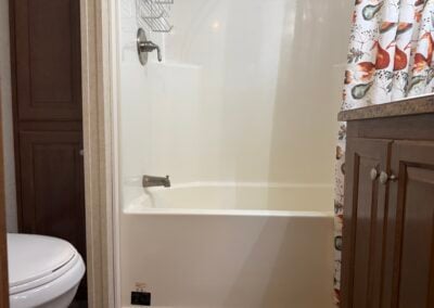 bathroom with full tub