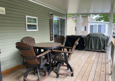 outside view of deck with dining table set